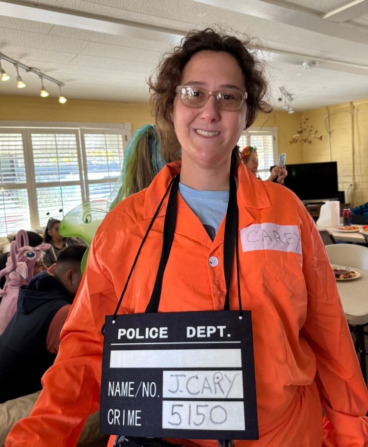 Carey dressed in Orange